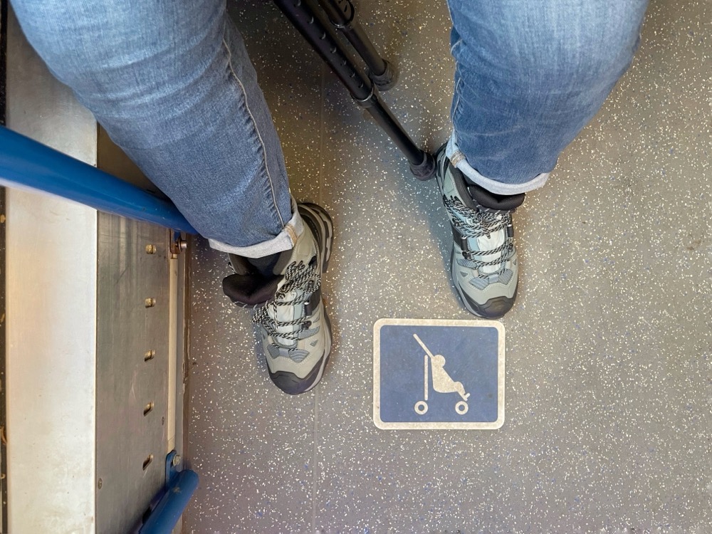 Sitting in the handicapped spot on the tram, as shown from above. 